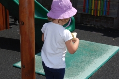 child by weaving poles